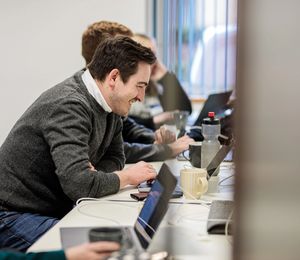 man on computer